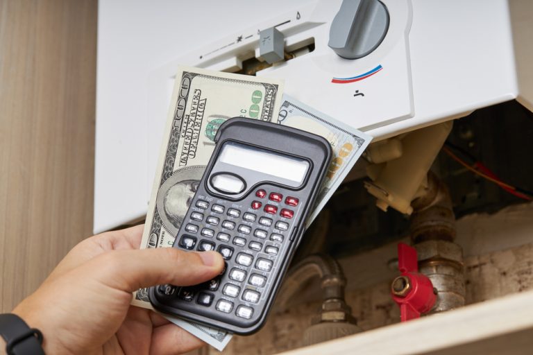 Star Water Heater Repair Cost-holding-calculator-money